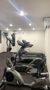 a gym with a bike in a room at Royal Ibirapuera Park in Sao Paulo