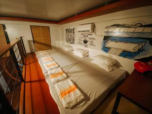 Postel nebo postele na pokoji v ubytování The Bistro House - Loft Unit - Vigan + 37 fotografií