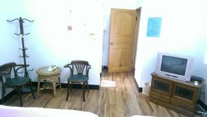TV a/nebo společenská místnost v ubytování Cuiti B&B + 18 fotografií