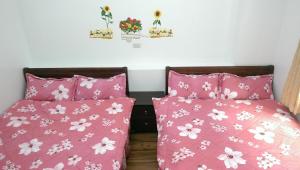 A bed or beds in a room at Cuiti B&B