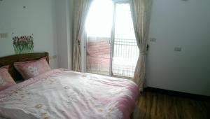 A bed or beds in a room at Cuiti B&B