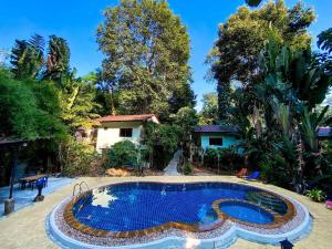 The swimming pool at or close to Kamrai Resort