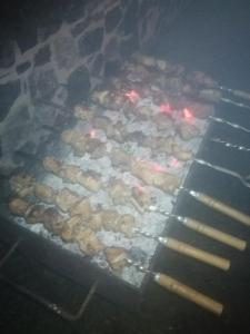 a bunch of donuts are cooking in an oven at Villa Barrandovská in Prague