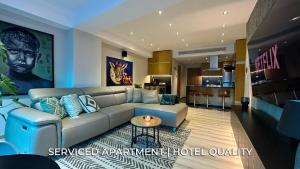 Serviced Apartment Pretty Penthouse Valencia tesisinde bir oturma alanı