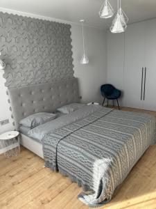 Posteľ alebo postele v izbe v ubytovaní VIP квартира в центре города, новостойка в ЖК Prestige Apаrtments, Ровно