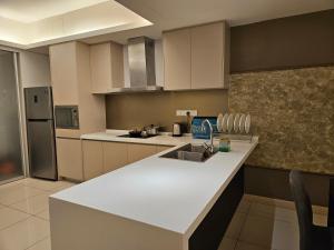 Η κουζίνα ή μικρή κουζίνα στο The Wisdom Apartment