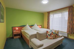 Postel nebo postele na pokoji v ubytování Hotel Ideal