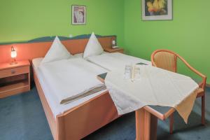 Postel nebo postele na pokoji v ubytování Hotel Ideal