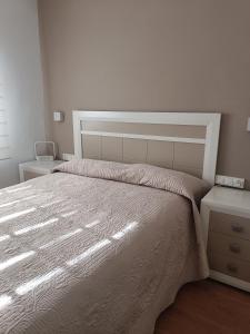 Postel nebo postele na pokoji v ubytování Noemar