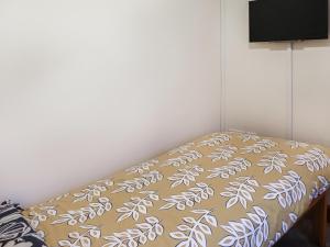 A bed or beds in a room at Bryn Poeth