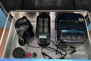 a drawer with various electronics in a box at Sound Garden Biei - Forest suite in Biei