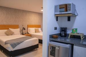 Kuchyň nebo kuchyňský kout v ubytování Hotel Bambu Milla De Oro