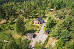an aerial view of a house on a hill at Cottage Charm - Cozy Getaway in the Archipelago in Naantali