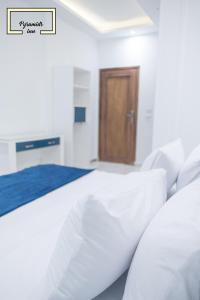 Letto o letti in una camera di Egyptus Pyramids Inn