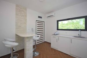 Koupelna v ubytování Apartments A Čanj + 37 fotografií