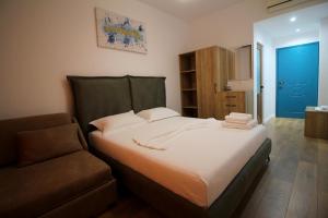 Postel nebo postele na pokoji v ubytování Ortus Rooms