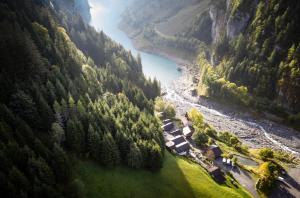 an aerial view of a river in a valley at Alphotel & Bergrestaurant Sankt Martin 