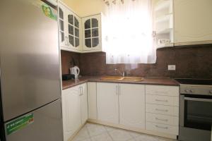 Kuchyň nebo kuchyňský kout v ubytování Ortus Rooms