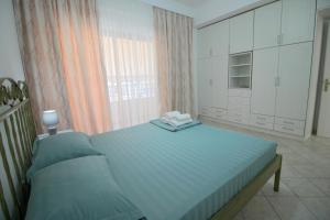 Postel nebo postele na pokoji v ubytování Ortus Rooms