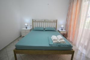 Postel nebo postele na pokoji v ubytování Ortus Rooms