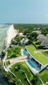 an aerial view of a resort next to the beach at Karafuu Beach Resort & Spa in Pingwe