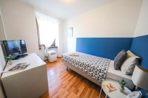 Postelja oz. postelje v sobi nastanitve Casa Zen