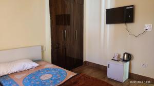 Voodi või voodid majutusasutuse Host Labs Homestay - Premium View toas