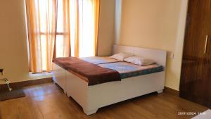 Voodi või voodid majutusasutuse Host Labs Homestay - Premium View toas