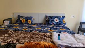 Voodi või voodid majutusasutuse Host Labs Homestay - Premium View toas
