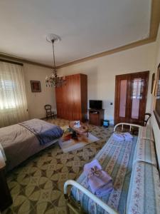 Postel nebo postele na pokoji v ubytování ViaEmilia