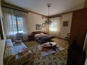 Postel nebo postele na pokoji v ubytování ViaEmilia