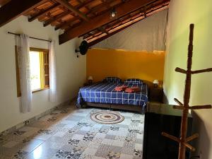 Postel nebo postele na pokoji v ubytování Rancho Potala