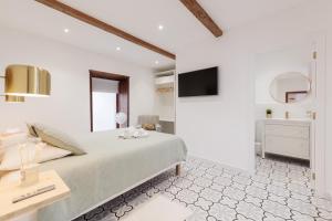 Postel nebo postele na pokoji v ubytování Casa Canaria Azucena