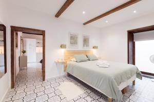 Postel nebo postele na pokoji v ubytování Casa Canaria Azucena