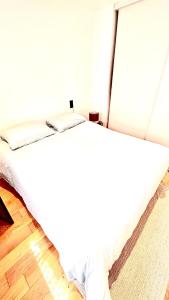 Posteľ alebo postele v izbe v ubytovaní Le Patio Jacuzzi Centre