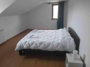 Postel nebo postele na pokoji v ubytování La VILA