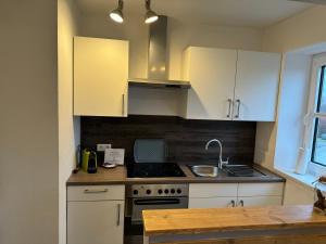 Kuchyň nebo kuchyňský kout v ubytování Ferienwohnung Nebelhorn in Dagebüll