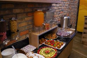 a buffet with many different types of food and drinks at Mai İnci Otel in Antalya
