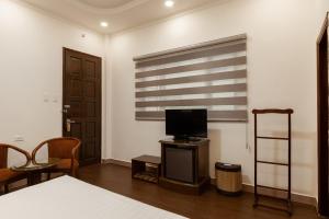 TV a/nebo společenská místnost v ubytování Lantern Hotel