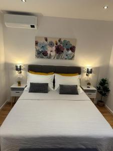 Posteľ alebo postele v izbe v ubytovaní Apartmani Vice