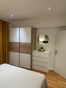 Posteľ alebo postele v izbe v ubytovaní Apartmani Vice