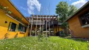 a building with scaffolding on the side of it at Landgasthof Zum Alten Weinstock in Rudersdorf