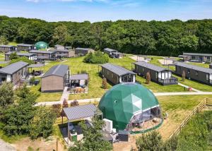 an aerial view of a camping facility with a domed tent at Angrove Country Park in Stokesley