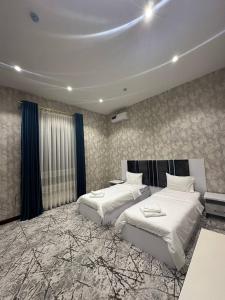 Katil atau katil-katil dalam bilik di Neo Hotel