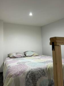 Cama o camas de una habitación en Studio cosy avec mezzanine