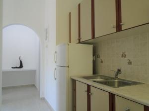 A kitchen or kitchenette at Leros Eleonas ApartmentS