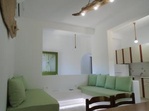 A seating area at Leros Eleonas ApartmentS