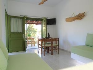 A television and/or entertainment centre at Leros Eleonas ApartmentS