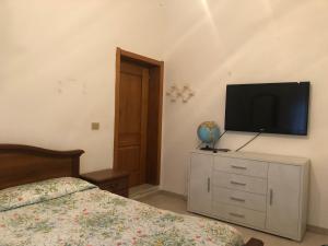 TV a/nebo společenská místnost v ubytování Casa Indipendente I DUE MARI