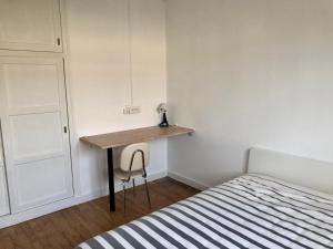 Posteľ alebo postele v izbe v ubytovaní Maison plain-pied Tarbes